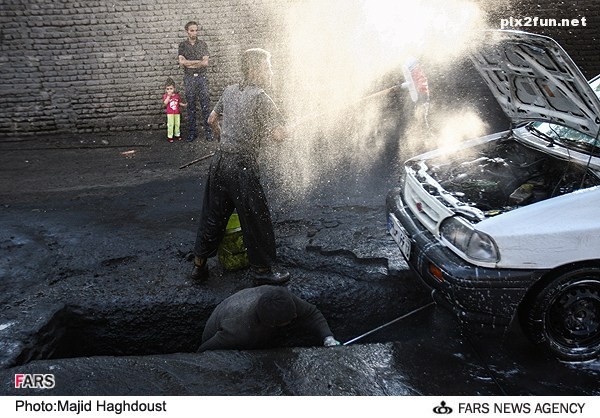 عکس از شستن ماشین های سنگین در تبریز